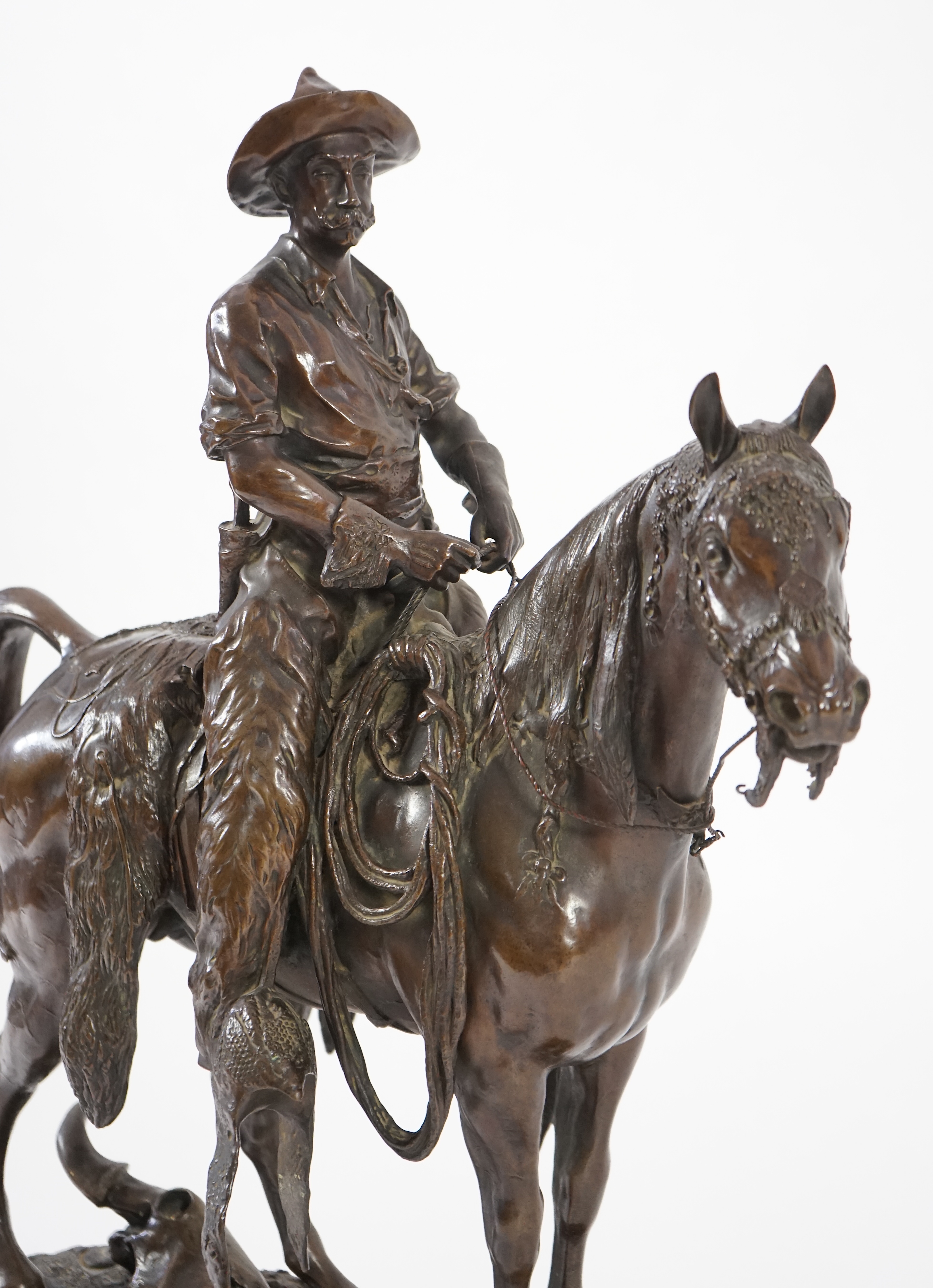 Walter Winans (St. Petersburg, 1852-Parsloe Park, Essex, 1920), a cast bronze of the artist, as a cowboy, riding the Arab stallion Skowronek, 50cm wide, 66cm high, overall 79.5cm high
